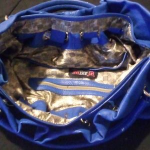 Selling this beautiful color blue bag